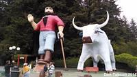 Paul Bunyan and Babe stand outside the Trees of Mystery